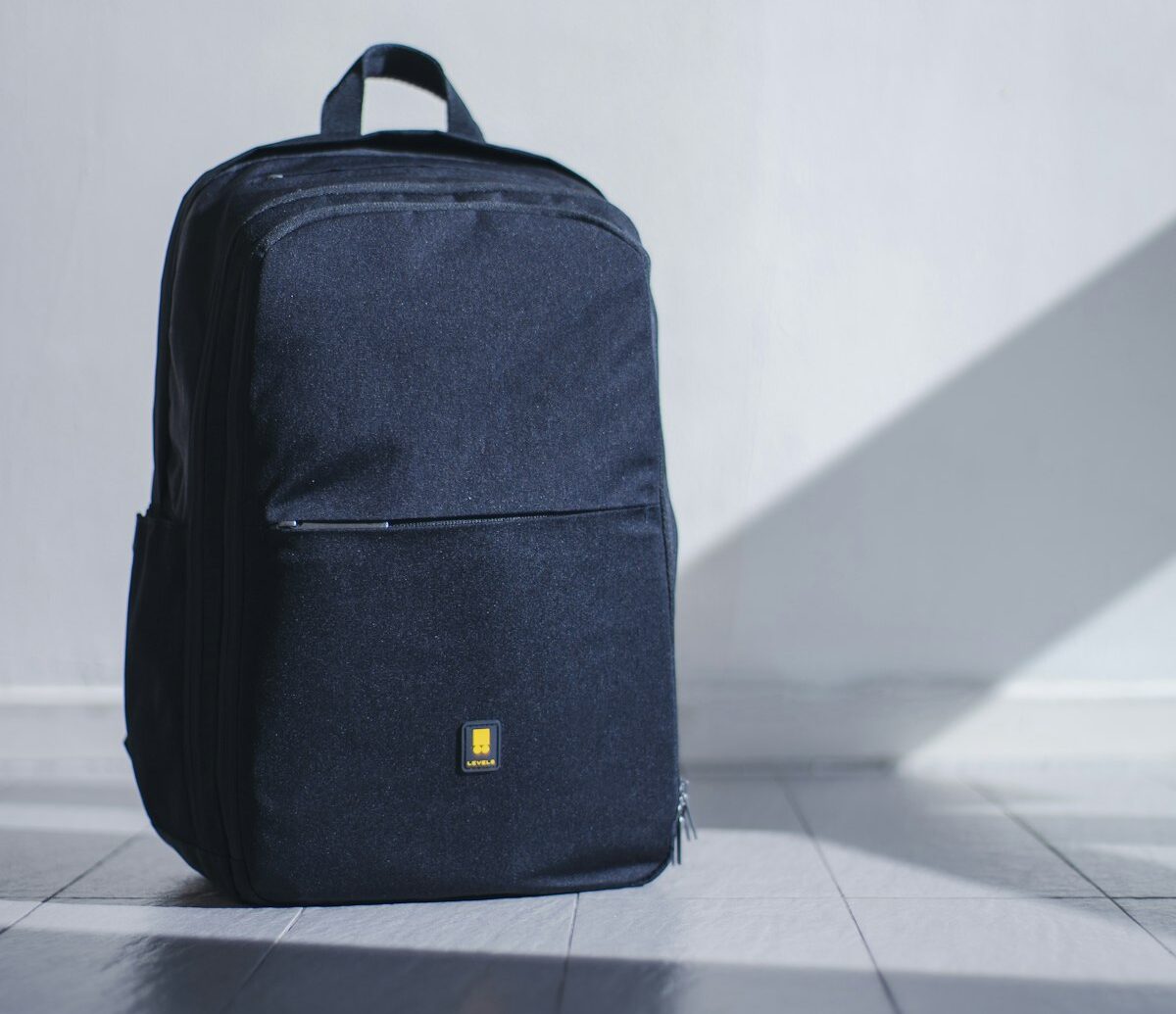 Polycarbonate vs aluminum luggage durability — aluminum hard-shell suitcase with grooved panels