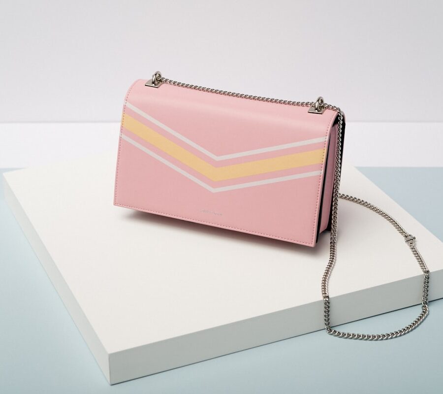 Quiet luxury bags — understated leather shoulder bag in stone beige