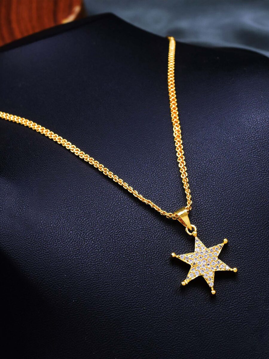 Gold pendant necklace with diamonds on a display stand, a fine jewellery gift